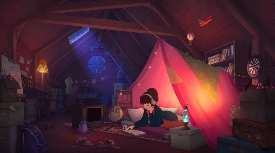 Spotify vs. Apple Music vs. YouTube Music: Hvilken er bedst? 3 En pige, der læser en bog og lytter til musik, mens hun ligger på gulvet ved siden af sin kat