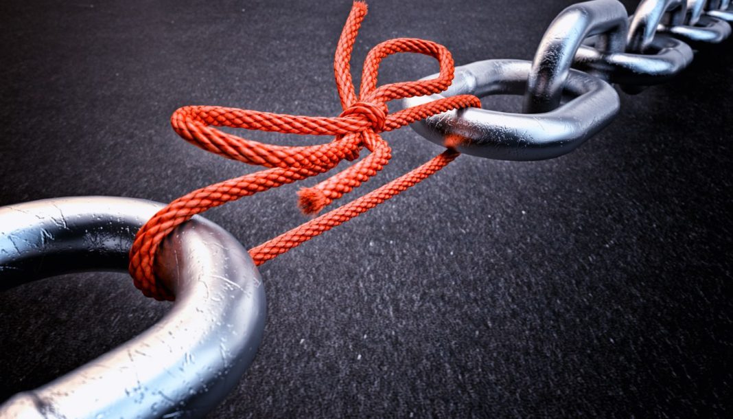 links-tjekker To halvdele af en kæde bundet sammen af et reb