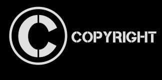 Et billede af et cirkelformet copyright-symbol med ordet "copyright" skrevet ud.