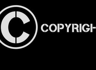 Et billede af et cirkelformet copyright-symbol med ordet "copyright" skrevet ud.