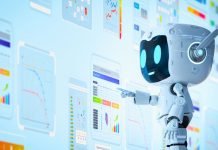 Venlig robot interagerer med digitale skærme og grafer, som illustrerer brugen af moderne AI-værktøjer til dataanalyse og automatisering.